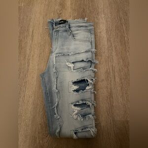 Distressed Light Blue Jeans